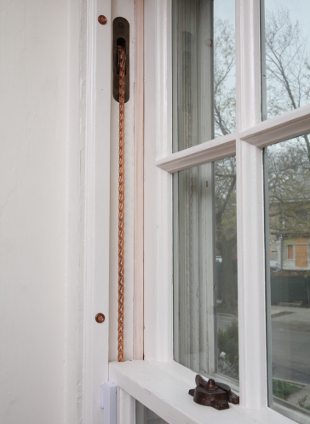 New sash chain on double hung window.